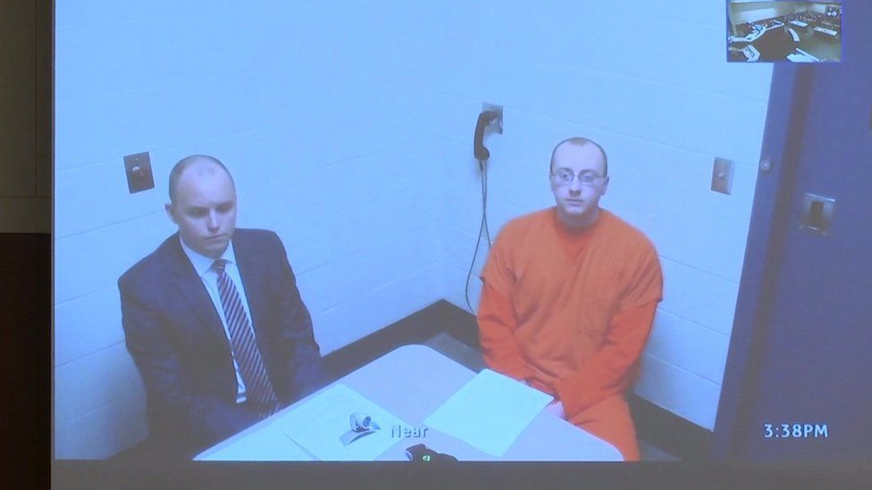 The suspect appeared in court via a video feed from jail