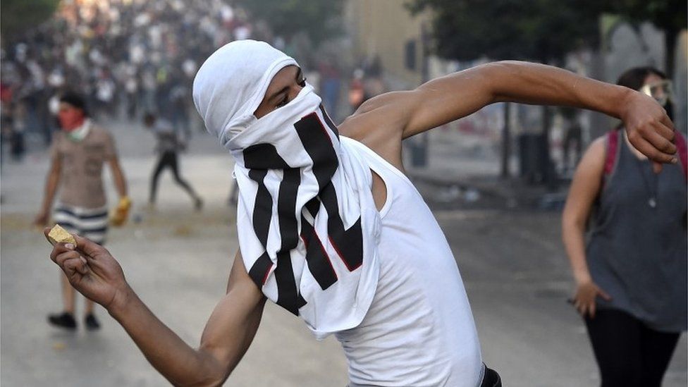 Demonstrator during anti-government protests following a massive explosion in Lebanon, 9 August 2020