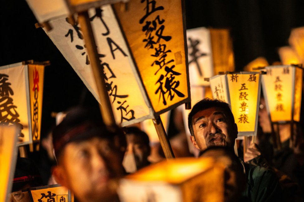 Men carry lanterns as they walk to a river to cleanse their bodies during the Sominsai Festival at Kokuseki-ji Temple in Oshu, Iwate Prefecture, Japan, on February 17, 2024.
