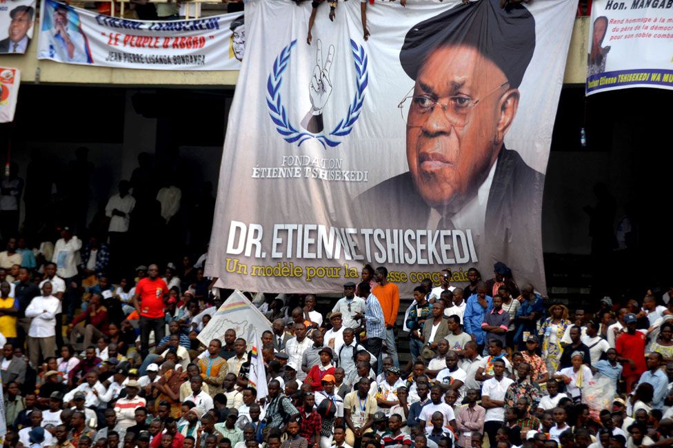 A banner dedicated to Etienne Tshisekedi, former Congolese opposition figurehead who died in Belgium two years ago, is seen hanging above supporters during a mourning ceremony at the Martyrs of Pentecost Stadium in Kinshasa, Democratic Republic of Congo May 31, 2019