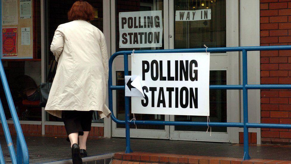 Woman at polling station