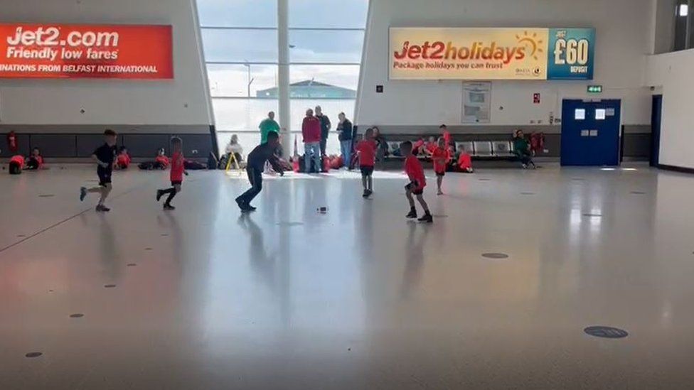 kids playing at airport