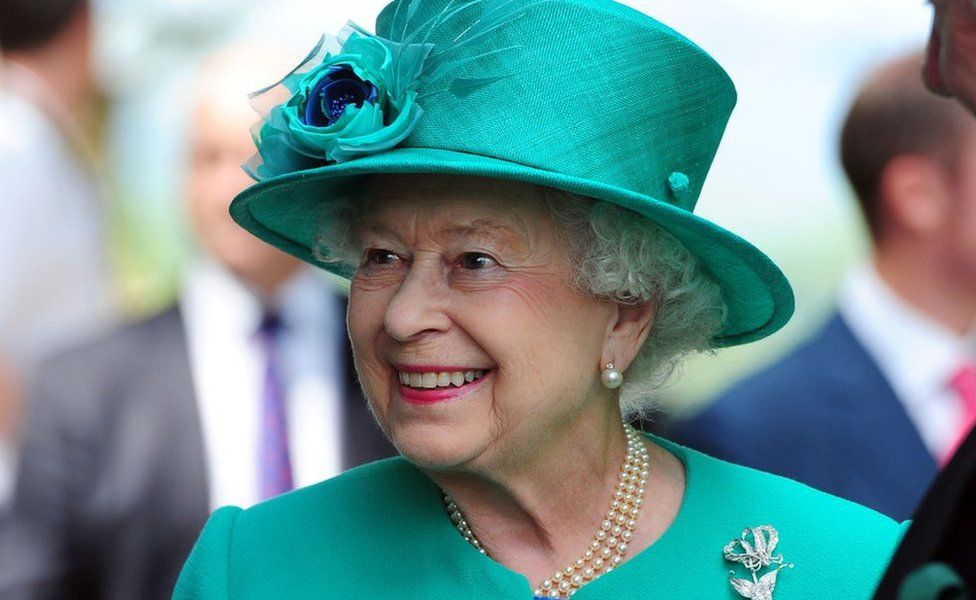 Queen Elizabeth II smiles during her trip to Bowness on Windermere, Cumbria on 17 July, 2013