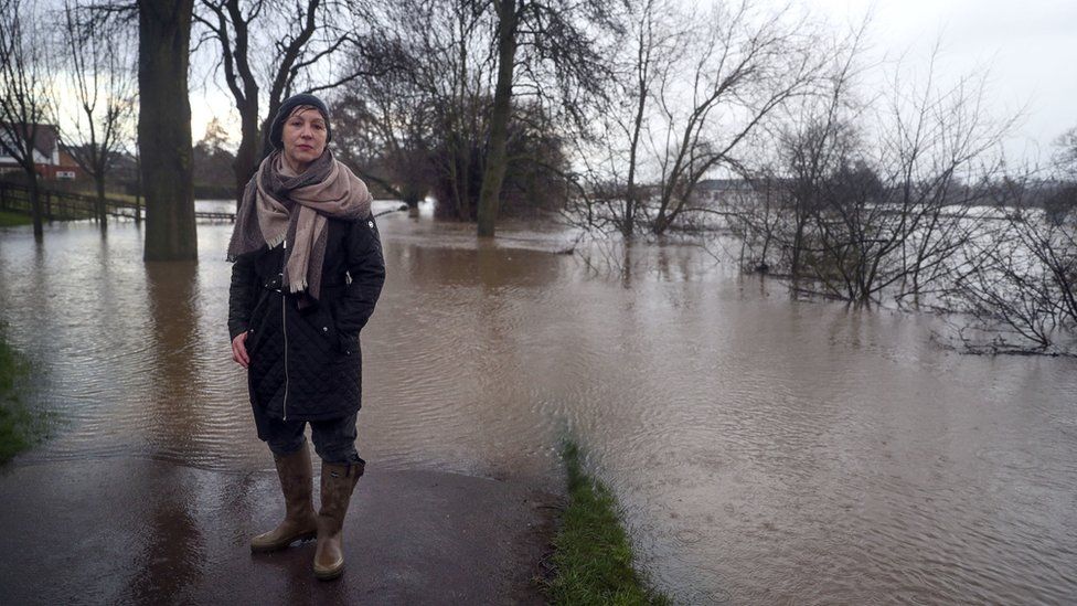 Rebecca Pow, next to the swollen River Severn in Worcester, on 18 February 2020
