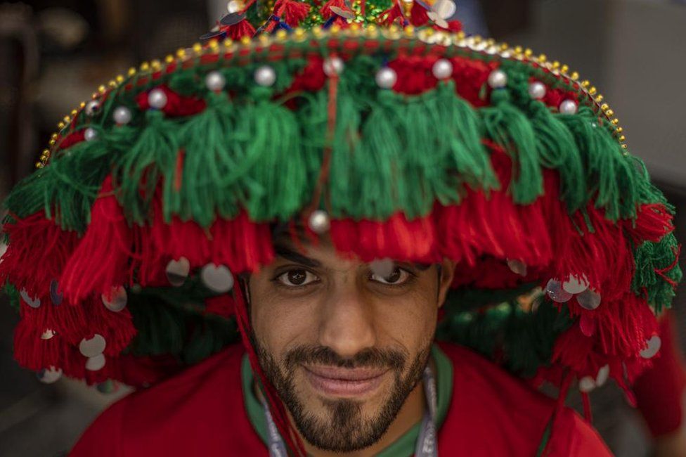 Fan of Morocco cheers at the Souq Waqif market during the FIFA World Cup 2022 in Doha, Qatar, 17 December 2022. Croatia will face Morocco in their FIFA World Cup 2022 third place soccer match on 17 December 2022.