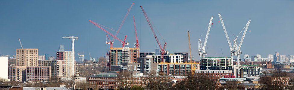 Construction cranes over the London skyline