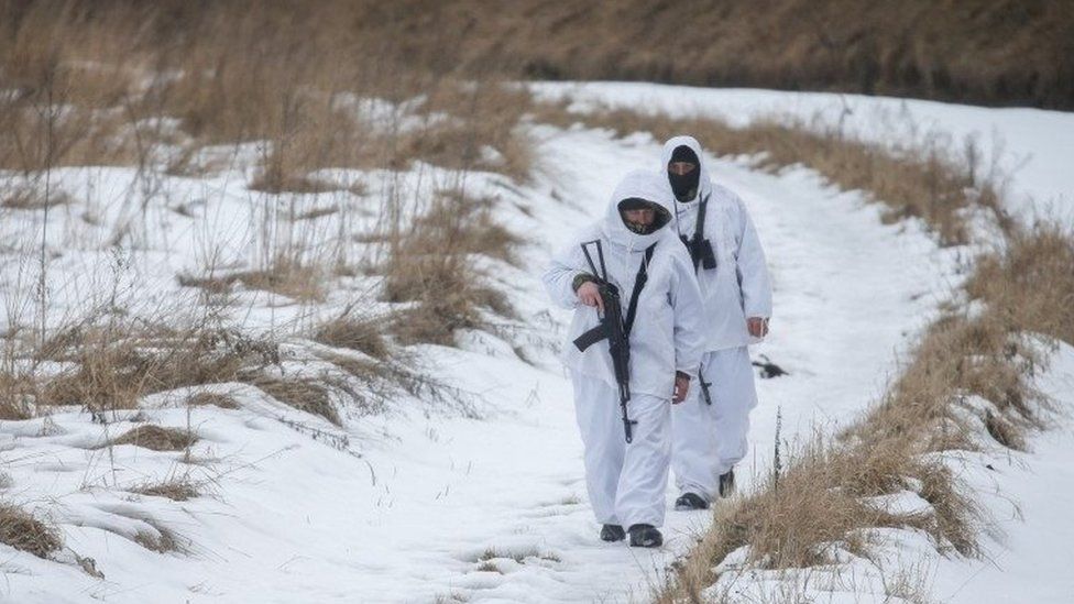 Ukrainian border guards patrol in Chernihiv region near the Russian border