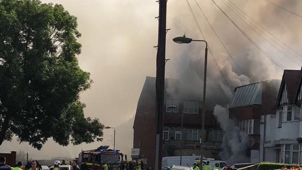 Family rescued and 14 treated after Golders Green flat fire - BBC News