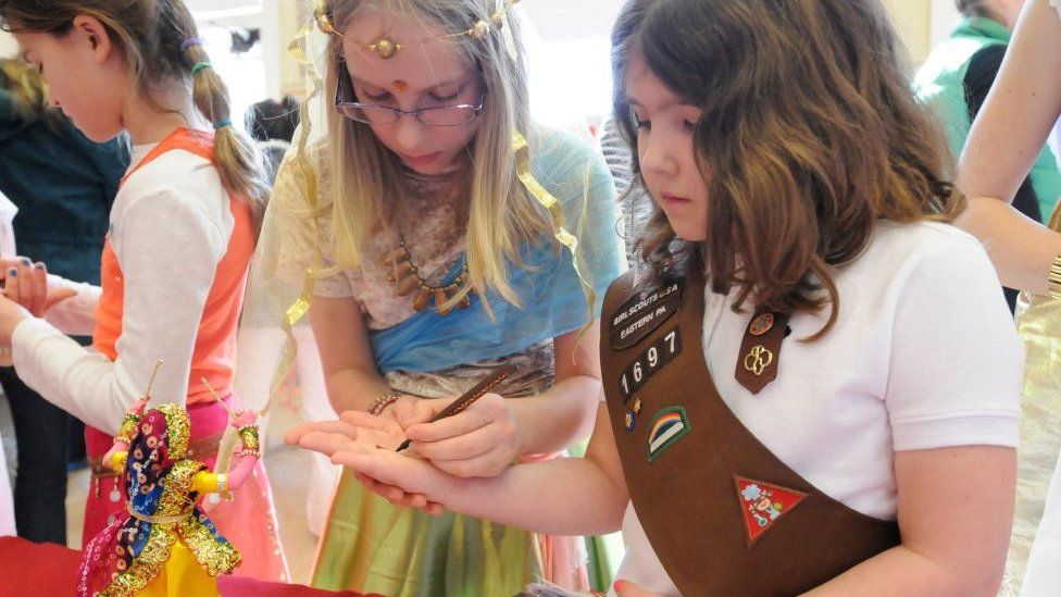 A Brownies girl at a scouting event