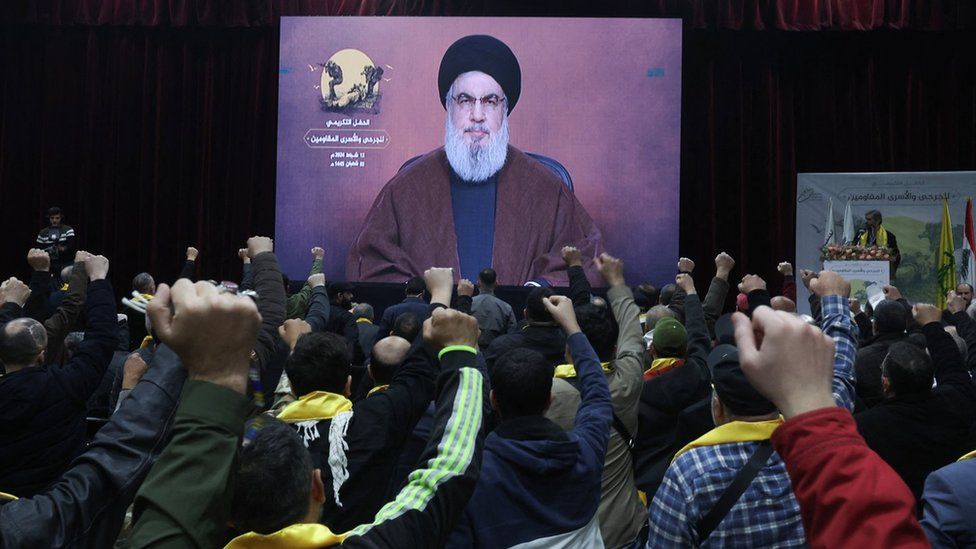 Hezbollah leader Hassan Nasrallah addresses his supporters in a televised speech, at a rally in Beirut, Lebanon (13 February 2024)