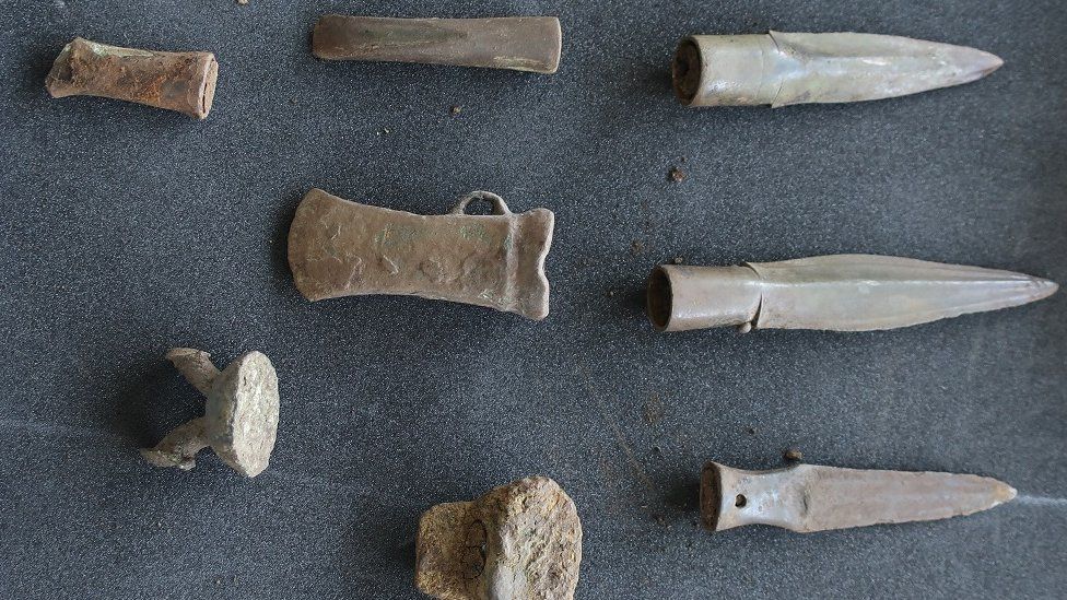 Hoard of spears, and a gouge, chisel and an axe and some metalworking waste