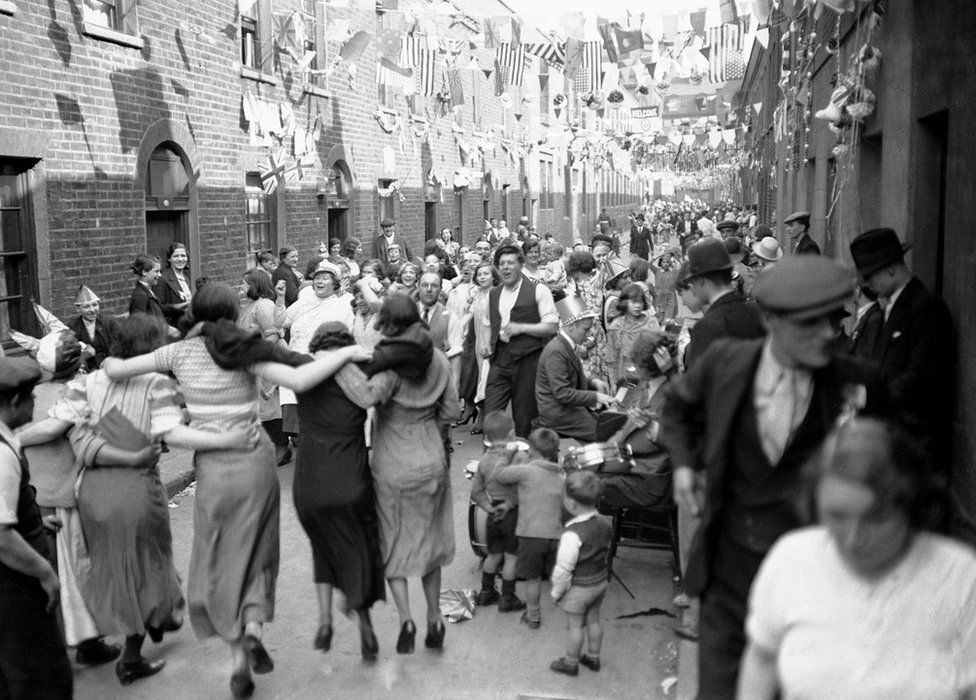Street Party in London's East End in celebration of King George V Silver Jubilee. 3rd May 1935