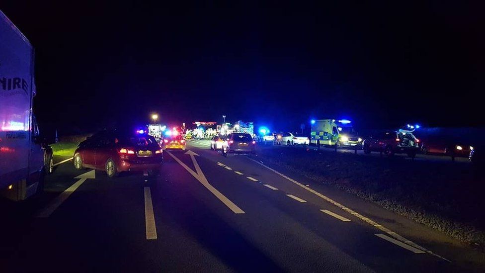 Emergency services vehicles at the crash scene