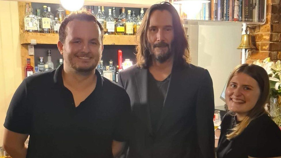 Keanu Reeves with Danny and Laura from the Fox and Hounds pub