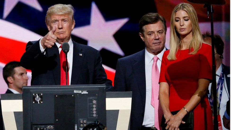 Republican presidential nominee Donald Trump gives a thumbs up as his campaign manager Paul Manafort and daughter Ivanka look on during Trump"s walk through at the Republican National Convention in Cleveland