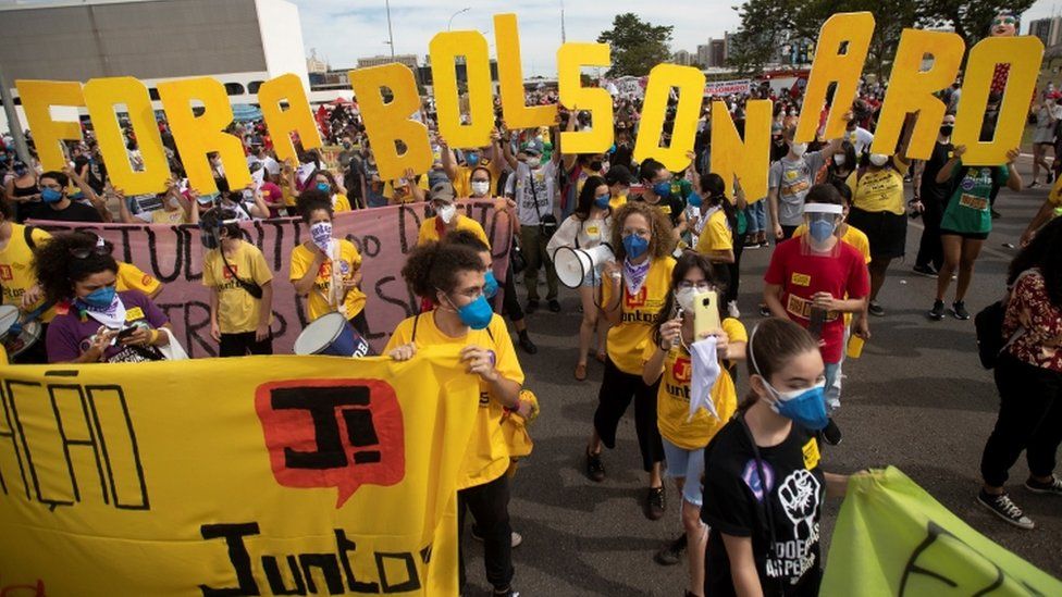 Opponents of Brazilian President Jair Bolsonaro attend a protest against his government in Brasilia, Brazil, 29 May 2021