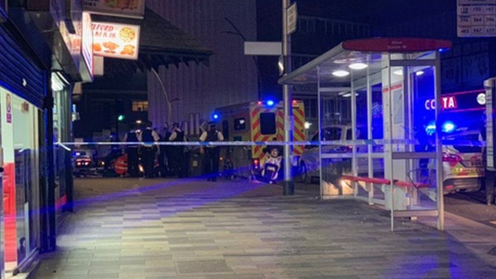 Emergency services at the scene of a stabbing near Ilford Station in the early hours of Tuesday
