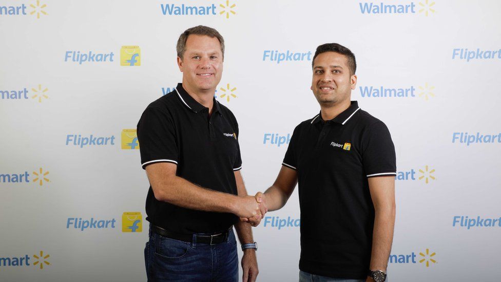 Flipkart co-founder and chief executive Binny Bansal (right) with Walmart chief Doug McMillon
