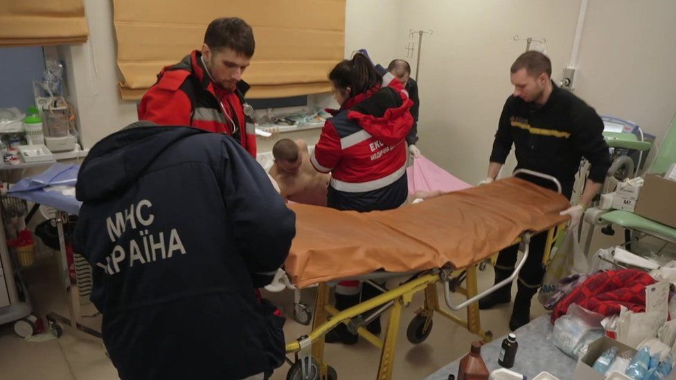 A man is treated in a hospital north-west of Kyiv