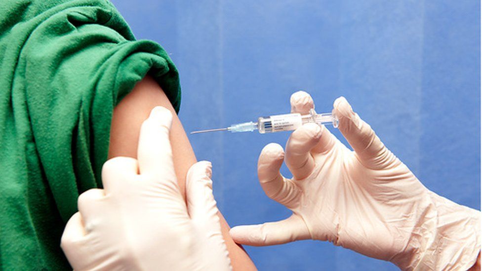 Teenager receiving the MMR vaccine