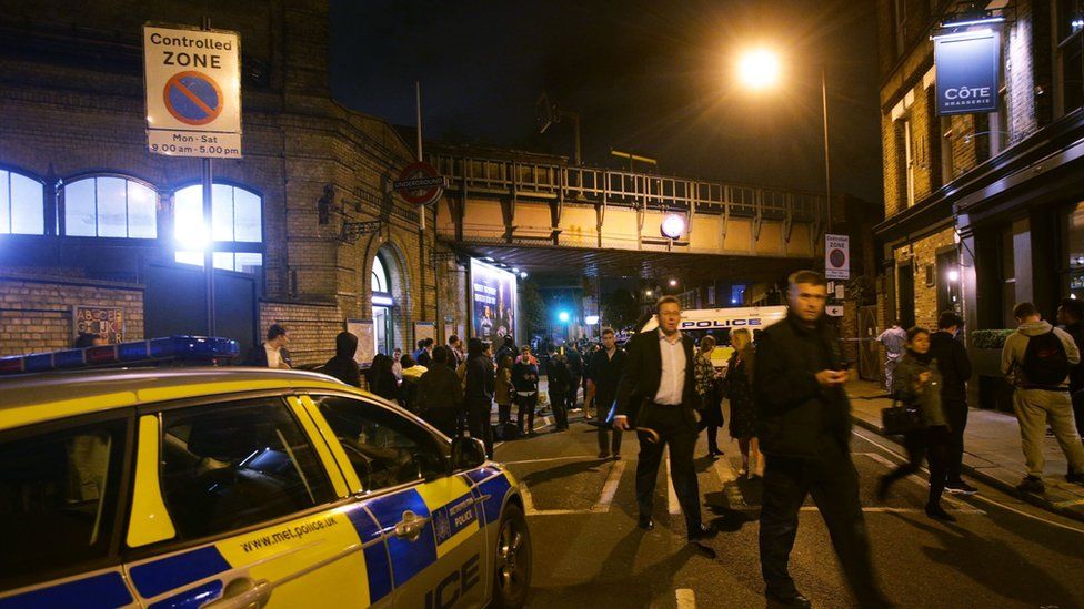 Police at the scene outside Parsons Green Tube station in London where three men have been stabbed