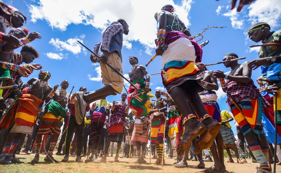 People in Kenya's Samburu region take part in a traditional dance, ahead of the Traditional Maralal Camel Race - Friday 6 October 2023