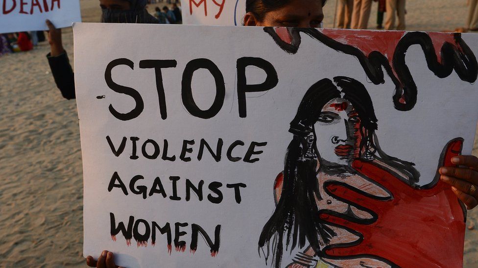 Indian members of NGO 'Aastha' hold placards during a protest in Mumbai for better safety for women following the rape of a student in the Indian capital