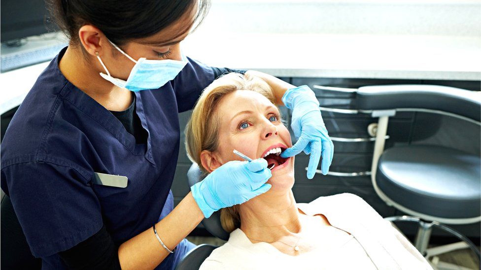 woman having dental examination