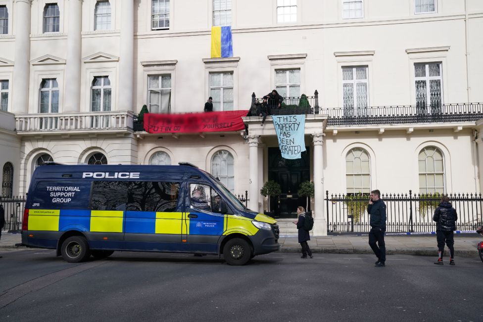 Squatters have draped Ukrainian flags over the property believed to be owned by Oleg Deripaska.