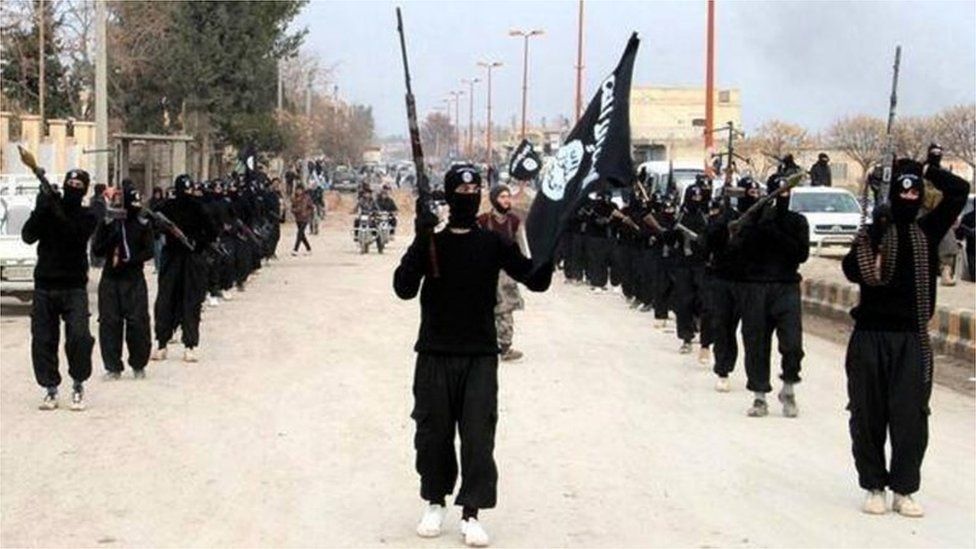 IS militants in Raqqa (file photo)