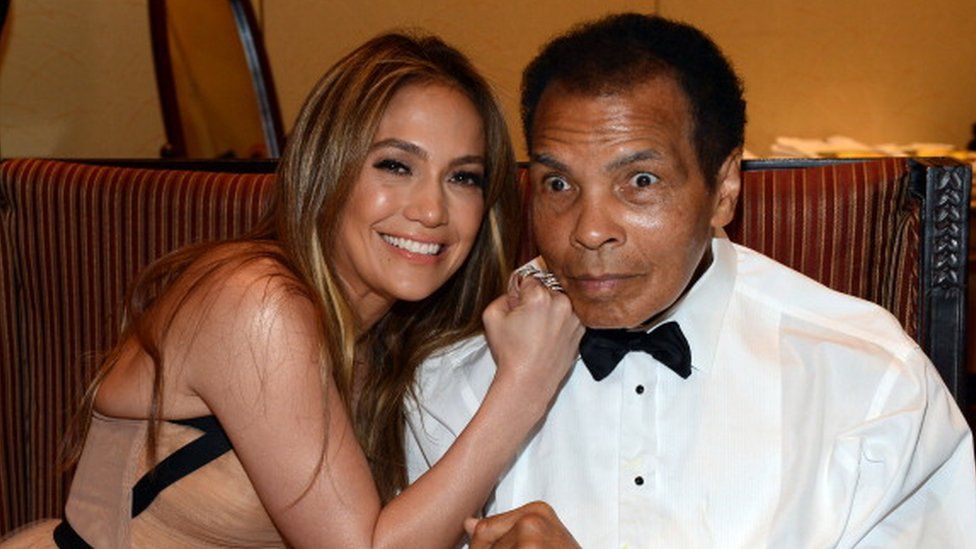 Singer Jennifer Lopez and boxer Muhammad Ali attends Muhammad Ali's Celebrity Fight Night in Phoenix (23 March 2013)