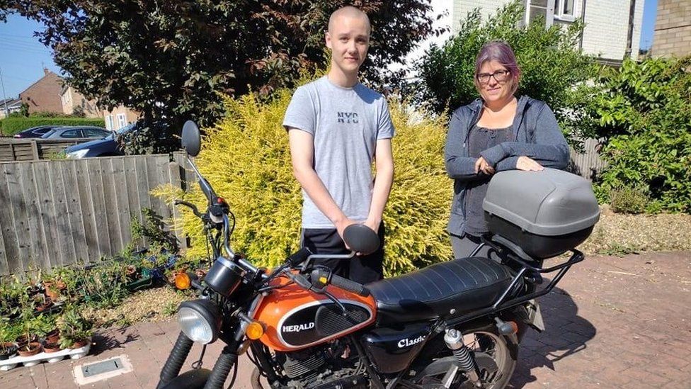 Illia and Rachael with the Herald 125