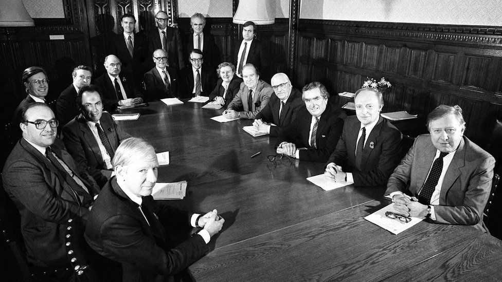Lord Radice (standing 3rd right) pictured with opposition leader Neil Kinnock and his Shadow Cabinet for 1984/85