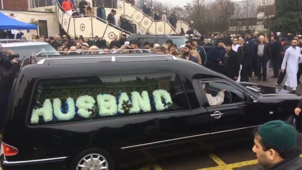 The funeral procession arrives
