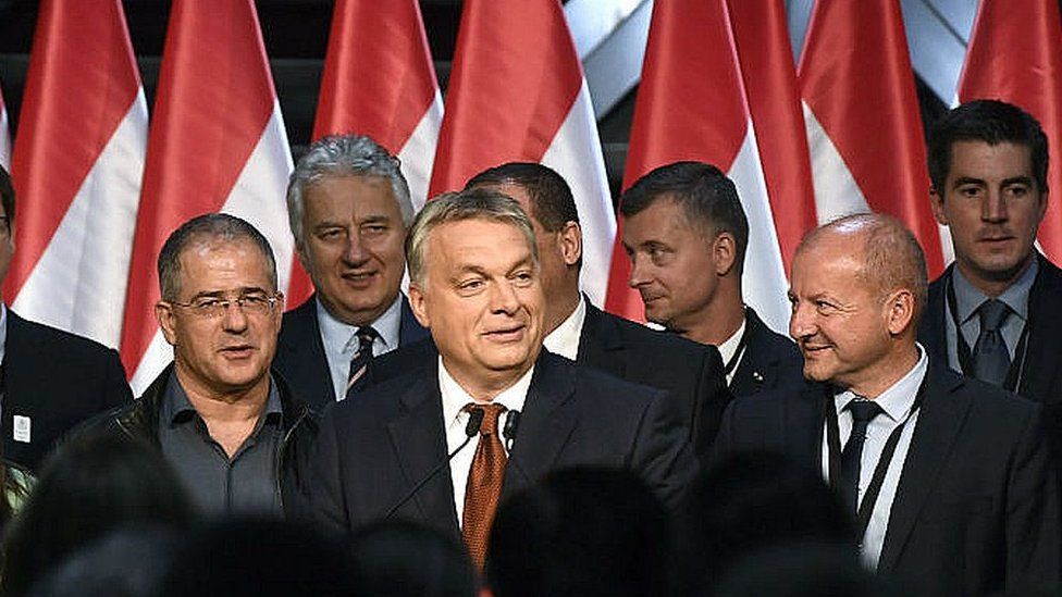 Hungarian Prime Minister Viktor Orban, centre, delivers speech after referendum in Budapest. October 2, 2016