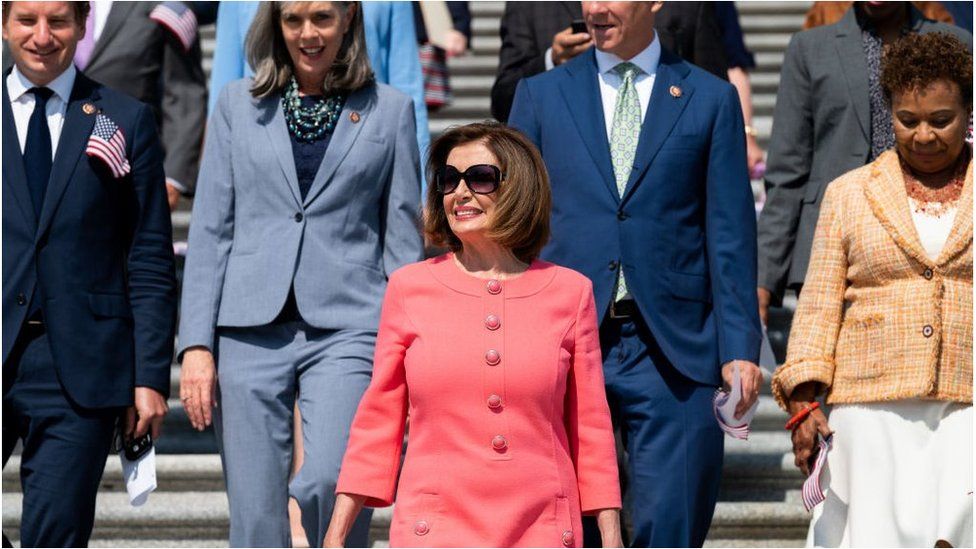 Speaker of the House Nancy Pelosi with fellow House Democrats