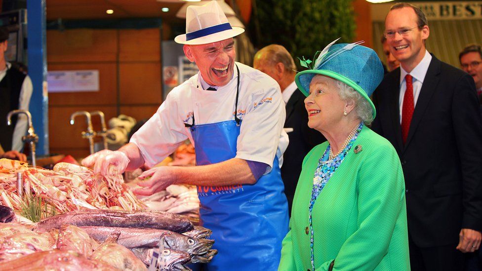 The Queen visited the English Market in Cork in 2011, accompanied by Simon Coveney (right)
