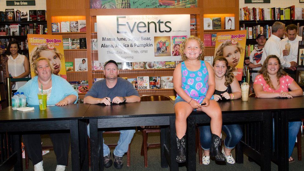 "Mama" June Shannon, left, Mike "Sugar Bear" Thompson, Alana "Honey Boo Boo" Thompson, Anna "Chickadee" Shannon and Lauryn "Pumpkin" Shannon at a book event in 2013.