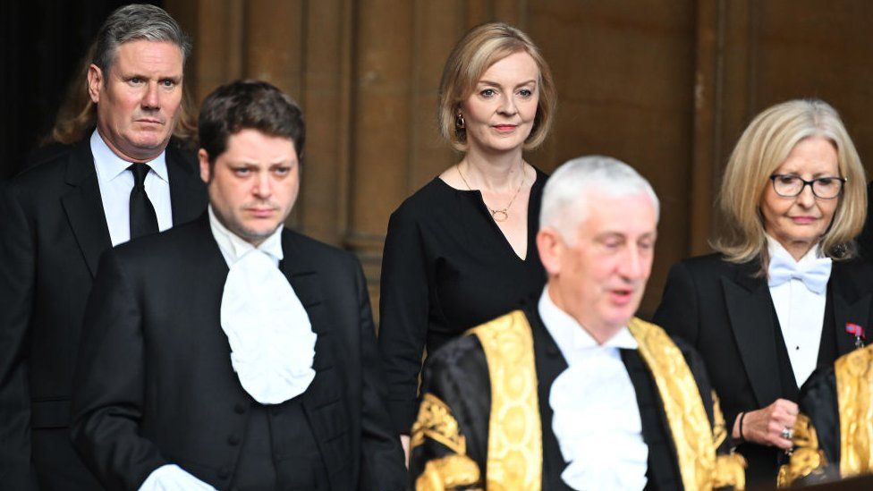 Sir Keir Starmer with Liz Truss, leaving the Palace of Westminster after the Presentation of Addresses