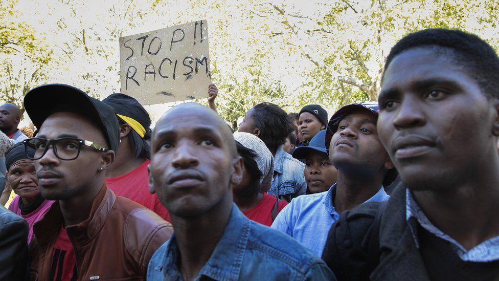 Protesters take part in a march at Stellenbosch University on 18 September 2015