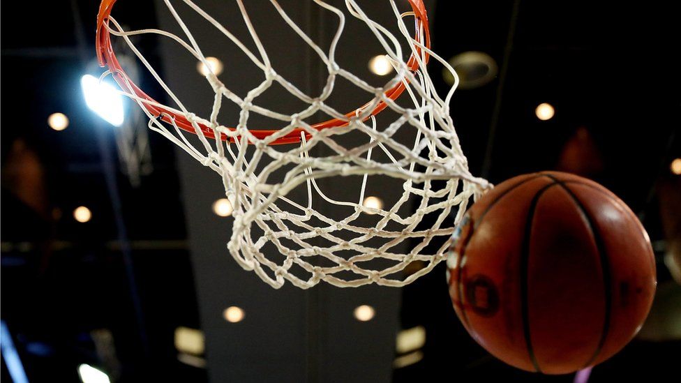 A basketball hoop and ball
