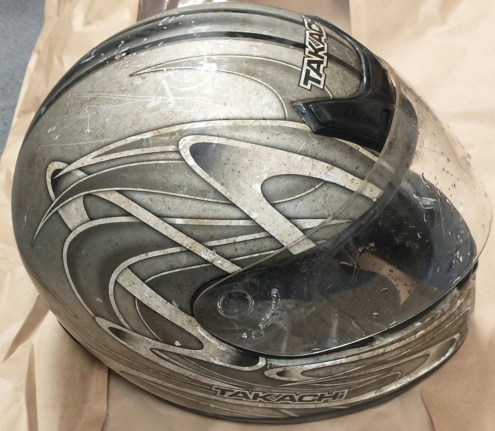 Police make motorcycle helmet appeal in murder investigation - BBC News