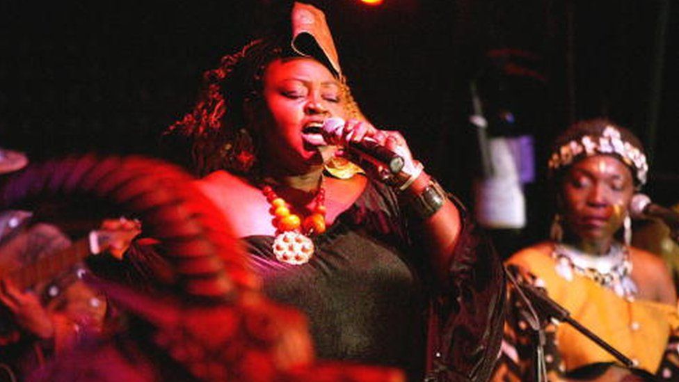 Kenya's Afro-jazz singer Achieng Abura performs one of her songs at the Nairobi's Carnivore 13 March 2004 resturant, where she is trying to popularise her music especially among the youth who are used to the hip-hop style.