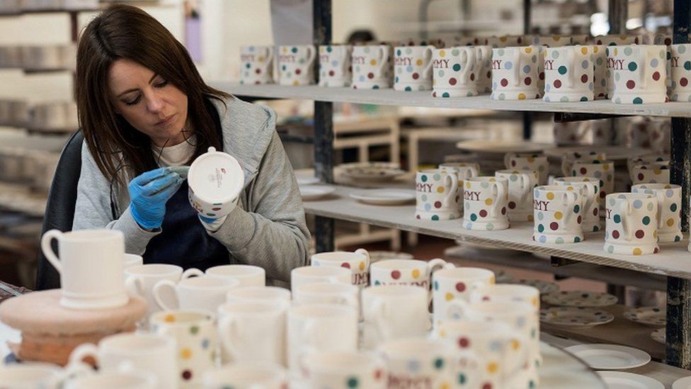 Female worker in ceramics factory