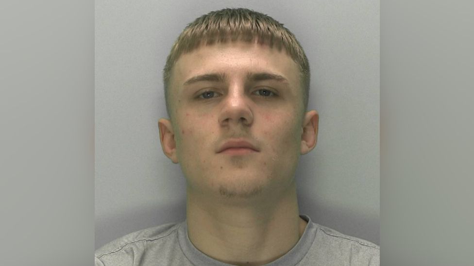 Police shot of jailed man Elliott Fitts-Hawkins with blurred lines around the side of image