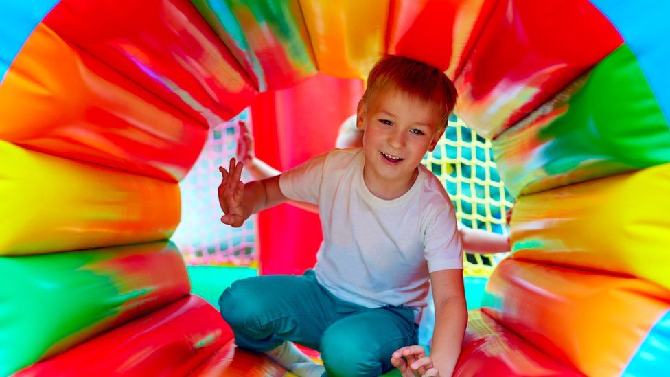 boy on inflatables
