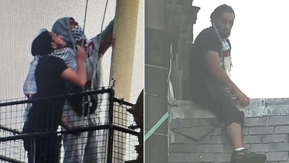 Images of two men on town hall roof