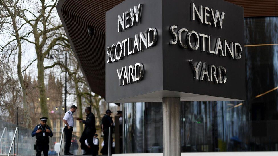New Scotland Yard sign at Met Police headquarters