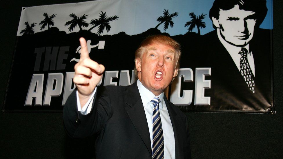 Donald Trump points figure at Apprentice casting event in 2006