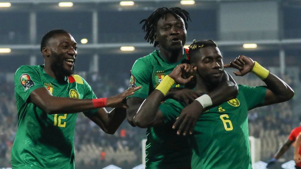 Cameroon players celebrate